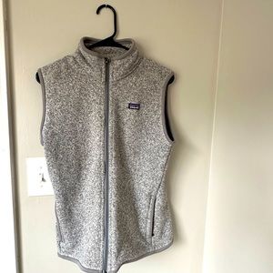 Patagonia gray vest. Sz large. Pockets have zippers.